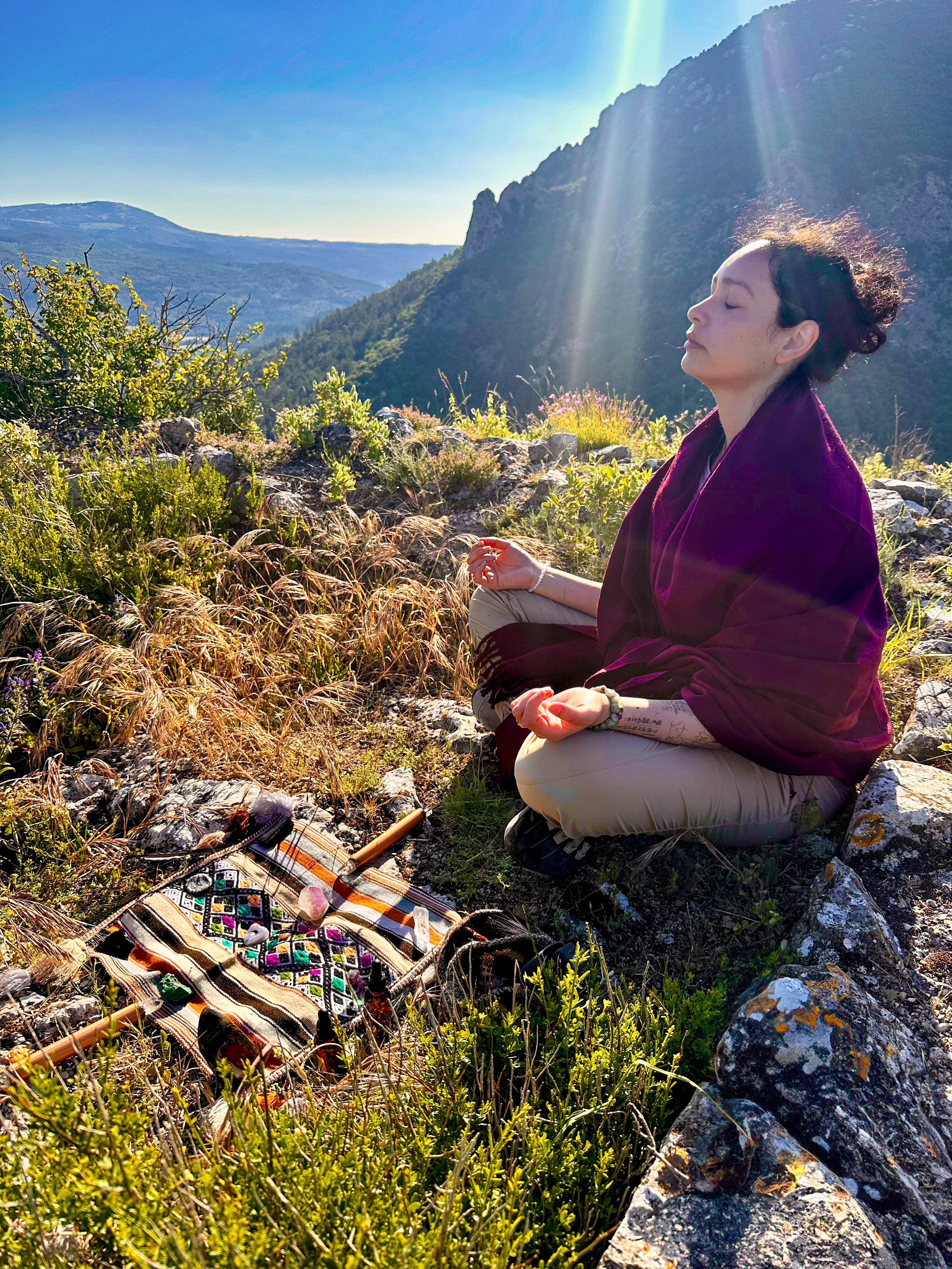 Mel Cobian holding ceremony on the mountain